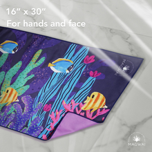 Load image into Gallery viewer, Eco-friendly MAGWAI quick-drying microfiber hand towel made from recycled plastic bottles, featuring the vibrant coral reef-inspired design; compact, soft, and ideal for travel, gym, or daily use
